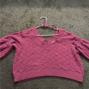 size medium pink sweater from alter’d state.